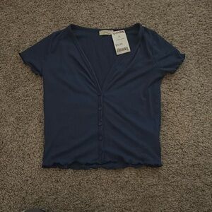Royal blue, cropped button up t shirt.
